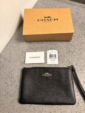 Coach Black Leather Wristlet with Gold Logo and Strap. New with box